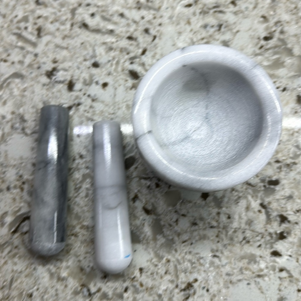 Marble mortar with two pestale